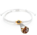 Photo projection bracelet — white cord, gold lens