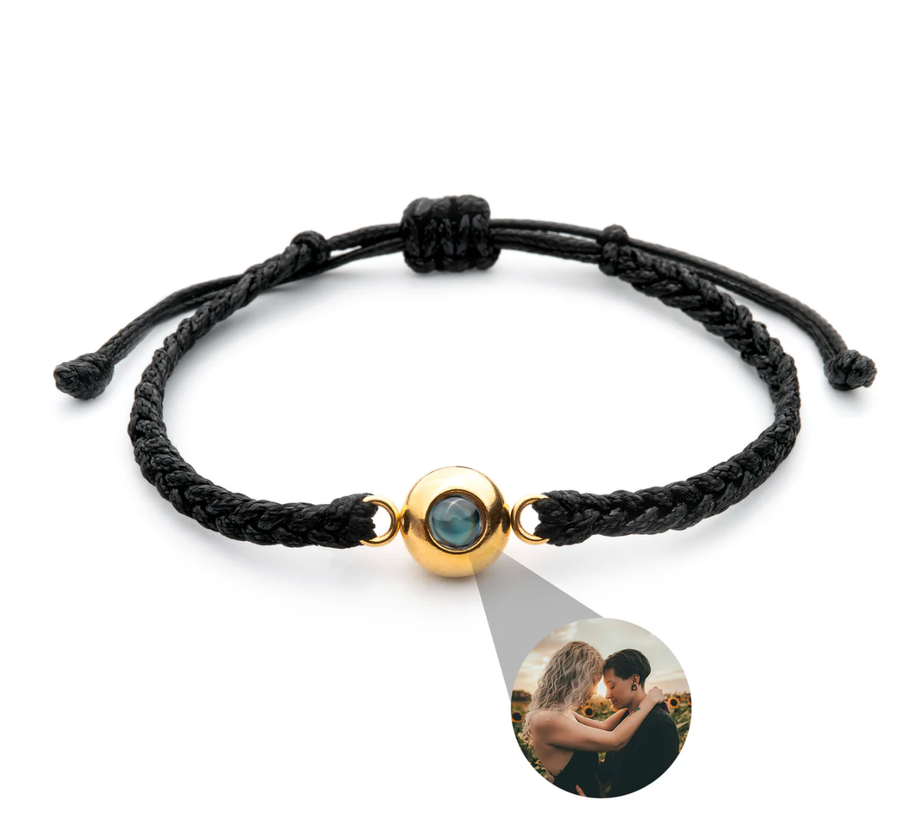 Photo projection bracelet — black cord, gold lens