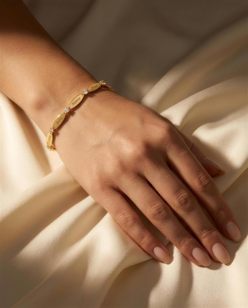 Duo Set — two gold personalized name bracelets