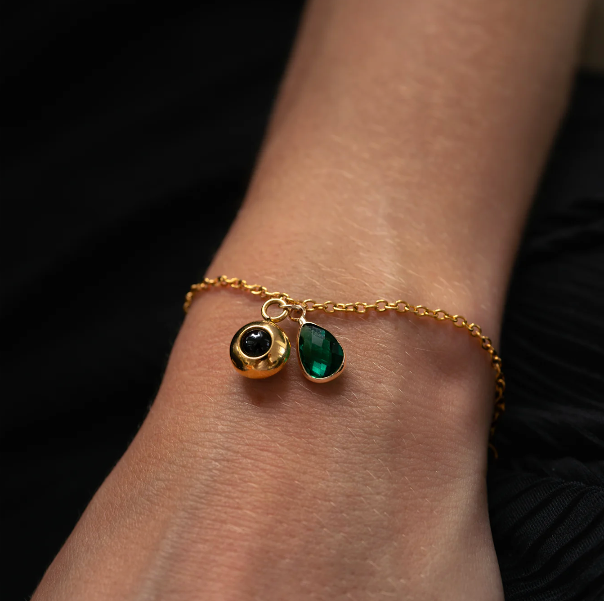 Photo projection bracelet with birthstone on a wrist