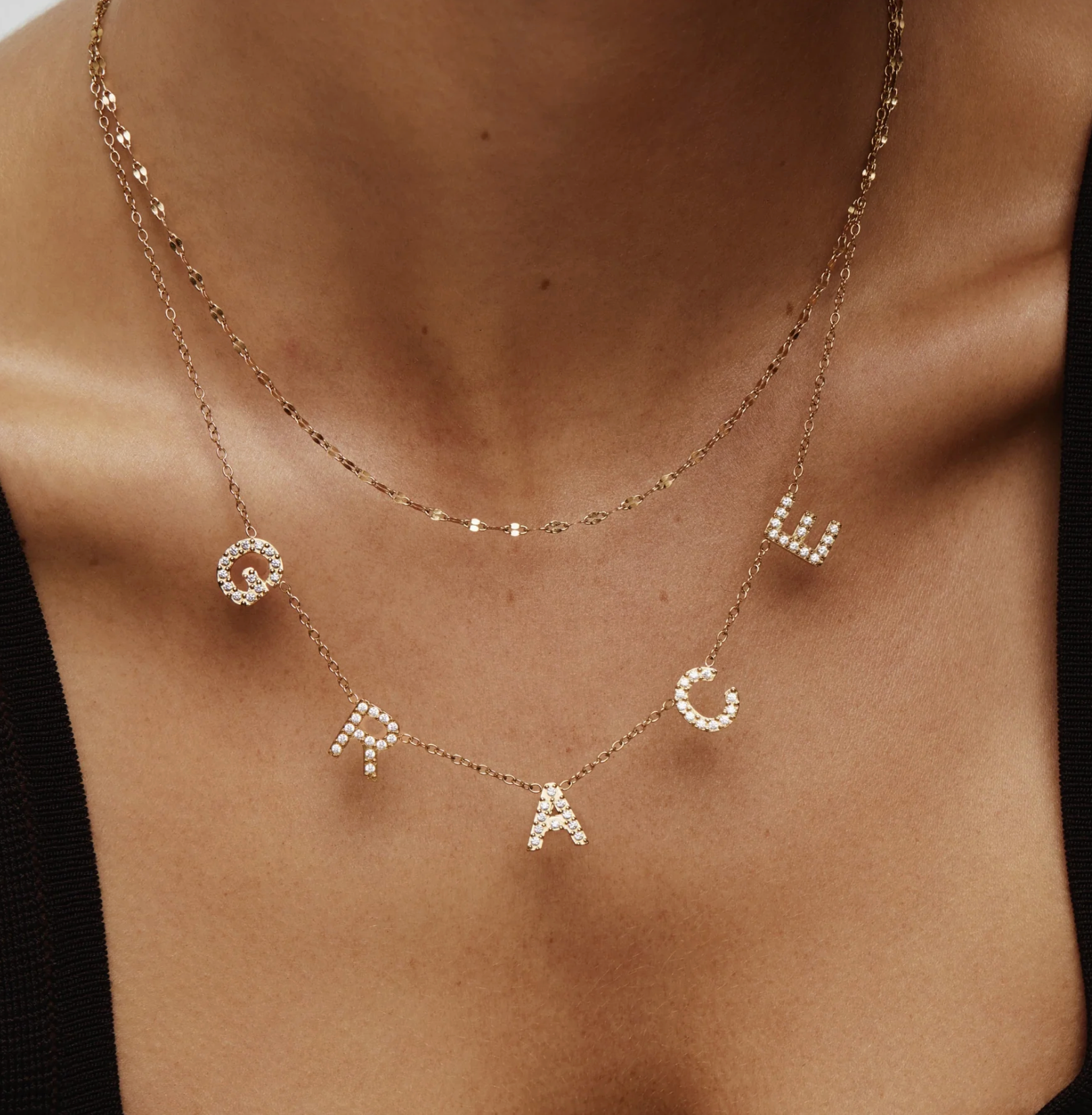 Pavé name necklace — GRACE on a model